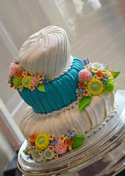 Colorful artistic fondant wedding cake