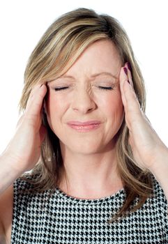 Woman having a bad headache, closeup