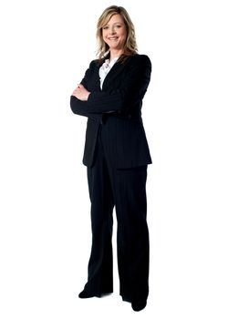 Full length portrait of an experienced business woman standing with arms folded
