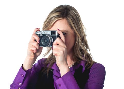 Beautiful lady taking pictures, studio shot