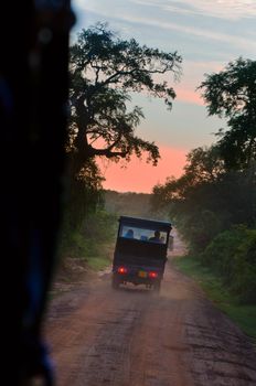 car on a dirt road equatorial countries