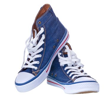 pair of simple gumshoes ( sneakers ) of denim canvas  on a white background