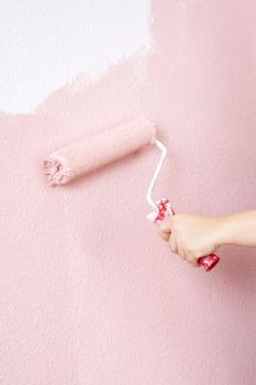 painting a wall in pink