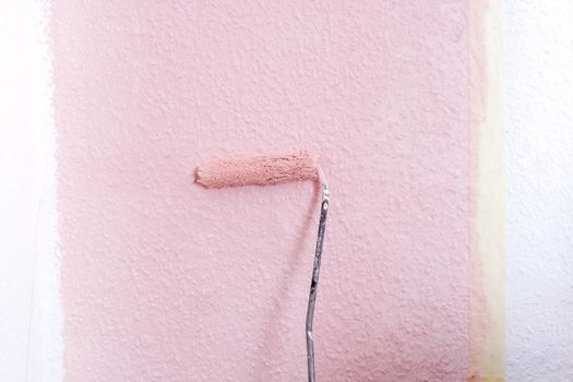 painting a wall in pink