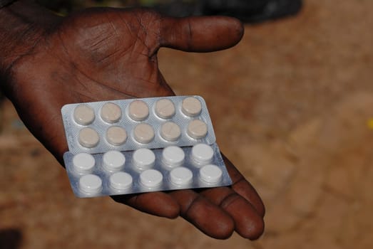 medicine in the hands of an African