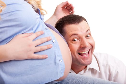 Family. A man  and pregnant woman on a white background