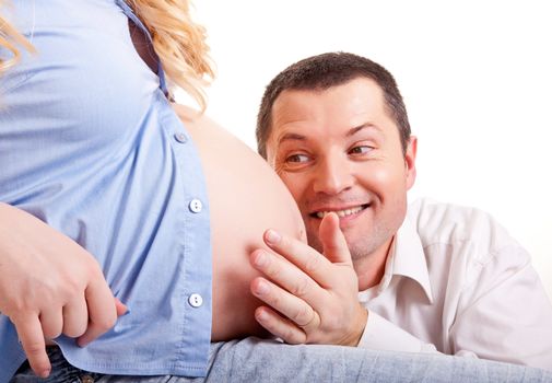 Family. A man  and pregnant woman on a white background