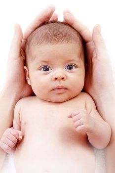 baby protected by mother's hands