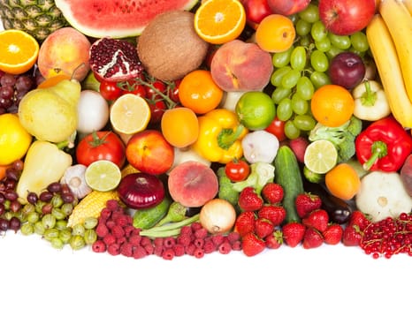 Huge group of fresh vegetables and fruits isolated on a white background. Shot in a studio