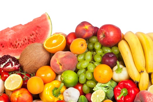 Huge group of fresh vegetables and fruits isolated on a white background. Shot in a studio