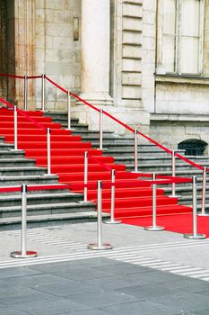 Beautiful shot of red carpet stairs awaiting vip, celebrities or government officials for a celebration orspecial  event.