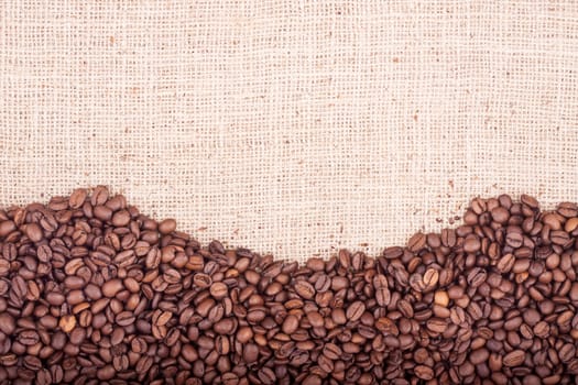 Brown roasted coffee beans. Shot in a studio