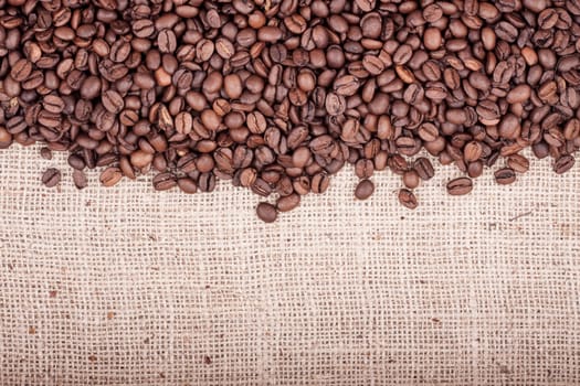 Brown roasted coffee beans. Shot in a studio