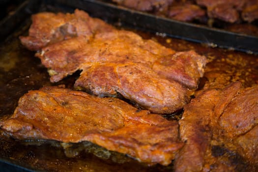 Steak and other meat on barbeque. Background. Smoke. Meals, Close-up