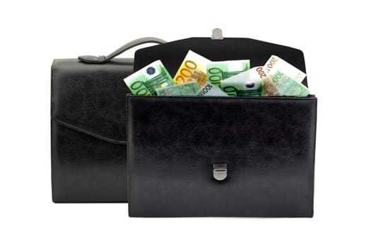 Black briefcase with money on a white background