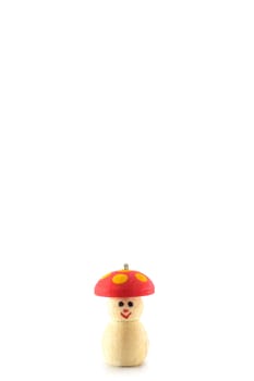 Wood model warring red hat and white background.