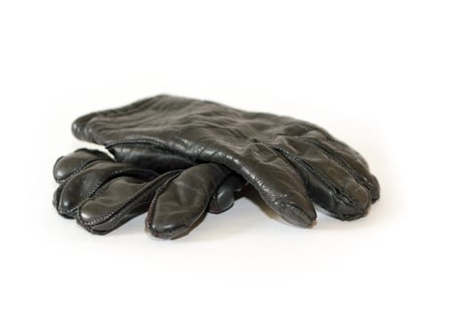 a rair of dark warm winter gloves isolated on white