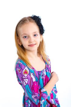 Portrait of young elegant girl in colorful dress. Isolated on white background
