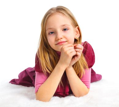 Happy girl lying on floor, isolated on white