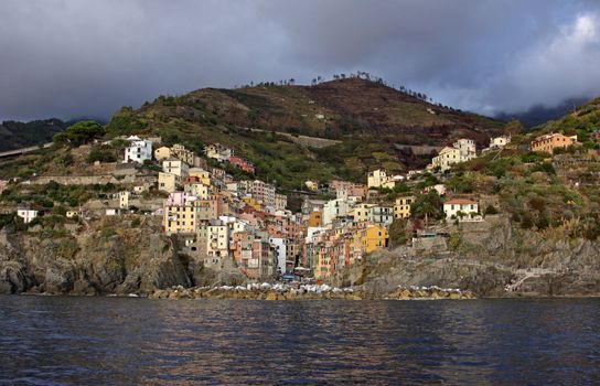 The village of Riomaggiore.  One of the five villages that make up Cinque Terre.  Located on the rugged coast of the Italian Riviera in the Liguria region of Italy.
