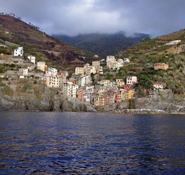 The village of Riomaggiore.  One of the five villages that make up Cinque Terre.  Located on the rugged coast of the Italian Riviera in the Liguria region of Italy.
