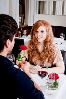 happy couple in restaurant romantic date love dinner valentines day wedding