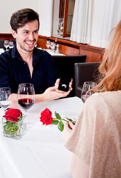 happy couple in restaurant romantic date love dinner valentines day wedding