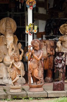 Bentota, Sri Lanka - December 14, 2011: Traditional asian wooden souvenir shop with various figures
