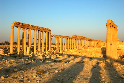 Relics Palmyra in Syria against blue sky. Ancient Roman time town in Palmyra (Tadmor), Syria.