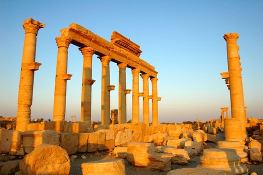 Relics Palmyra in Syria against blue sky. Ancient Roman time town in Palmyra (Tadmor), Syria.