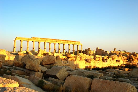 Relics Palmyra in Syria against blue sky. Ancient Roman time town in Palmyra (Tadmor), Syria.