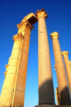 Relics Palmyra in Syria against blue sky. Ancient Roman time town in Palmyra (Tadmor), Syria.