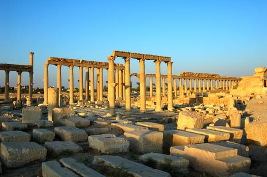 Relics Palmyra in Syria against blue sky. Ancient Roman time town in Palmyra (Tadmor), Syria.