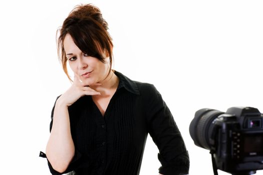 woman posing for photo with camera in foreground