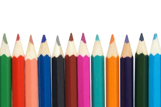 A row of multi colored pencils isolated on white background