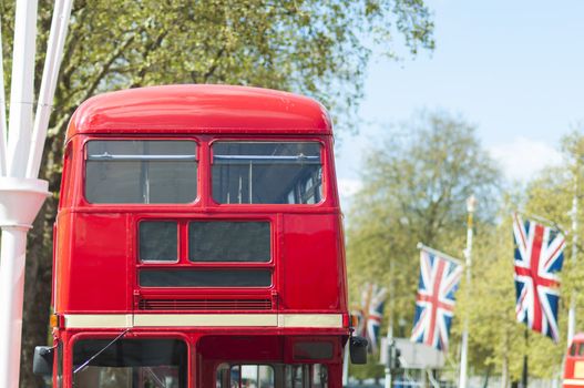 Cropped front shot of London red double deck bus with blank information panel.