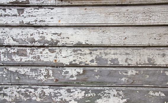 Picture of a wall textuer where paint has fallen off