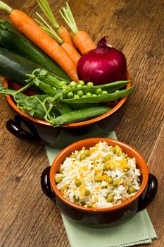 risotto with fry and peas in crock