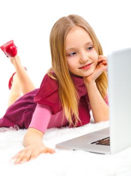 Attractive young girl using notebook computer. Isolated on white background.