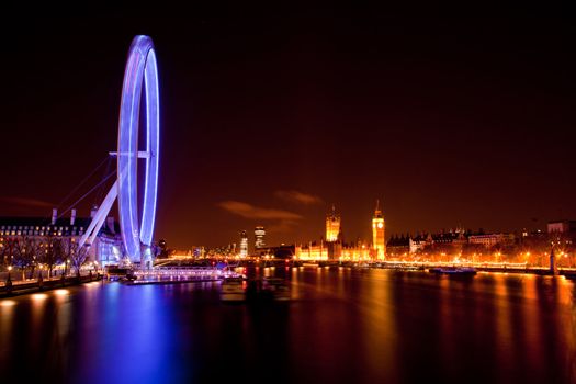 LONDON - April 15: London Eye with Big ben, on April 15, 2012 in London. The largest Ferris wheel in Europe, structure of the London Eye is 135 M. tall and the wheel has a diameter of 120 M.