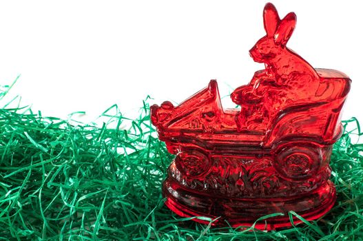 Sugar Easter bunny with car on grass with copy space