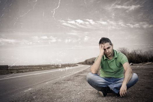 Old photo of a young man sitting out of the road:NOTE-Texture was added to simulate an old image.