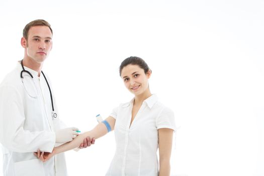 Patient receiving an intravenous injection from a young male doctor or nurse