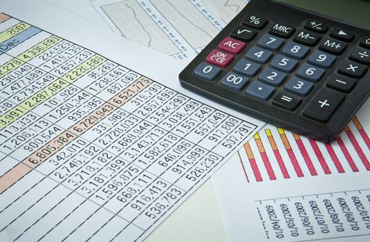 Graphs, charts, business table. The workplace of business people.