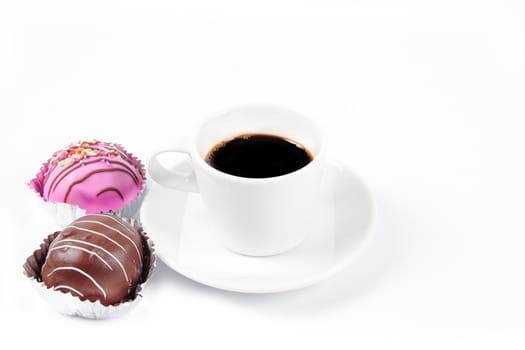 Black coffee cup with sweet chocolate
