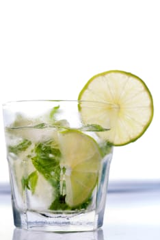 Green mojito with a slice of lime macro