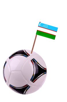 Soccerball or football decorated with a small national flag on a toothstick