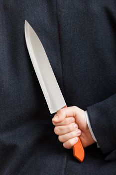 Murderer human hand holding sharp steel kitchen knife weapon