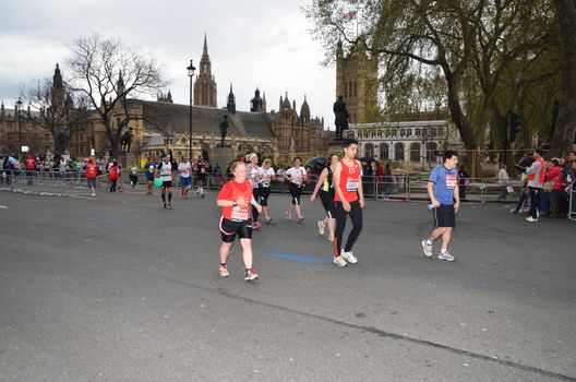 London - April 22: Runners Attending The Annual London Marathon London April 22nd, 2012 in London, England.