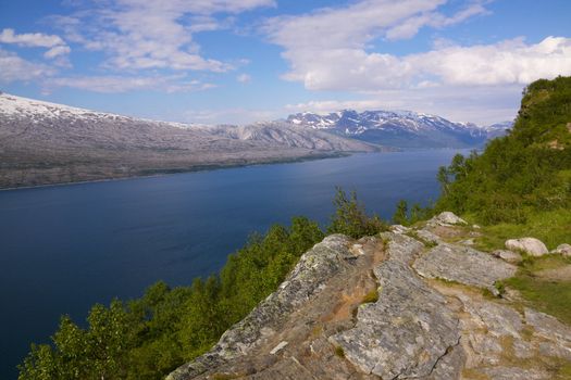 Typical deep norwegian fjord near polar circle